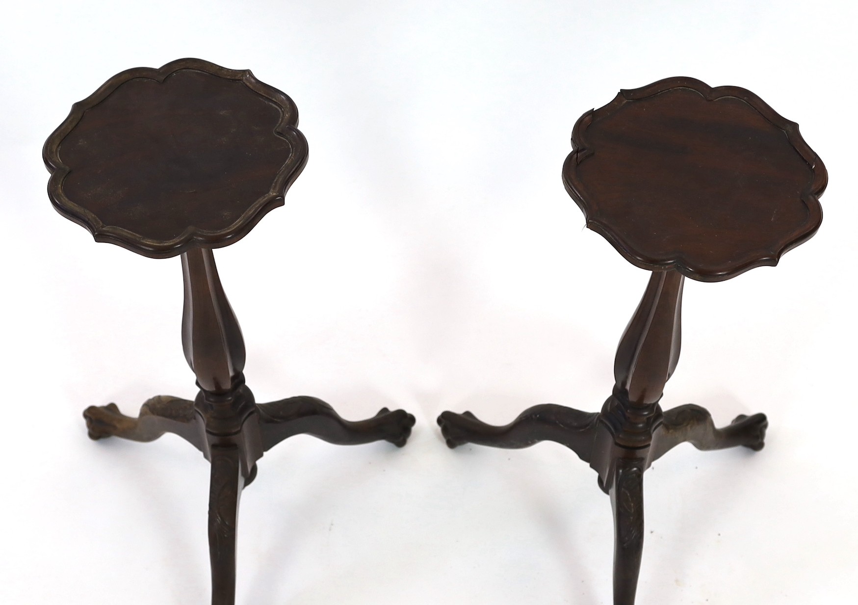 A pair of 18th century Dutch mahogany and oak torchere stands, width of tops 24cm height 69cm